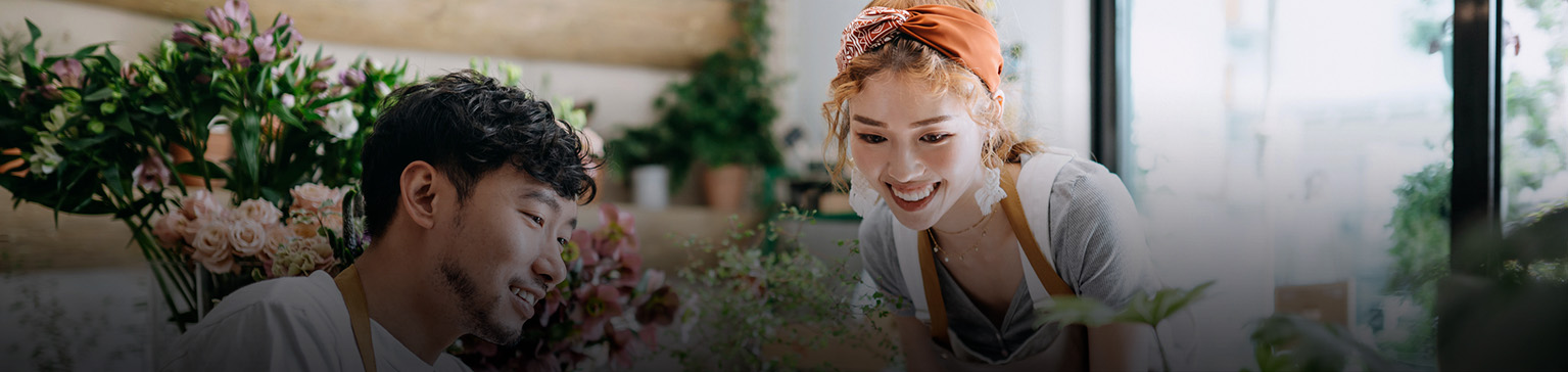 man and women in flower shop